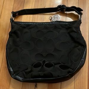 Black Coach logo bag. Canvas material